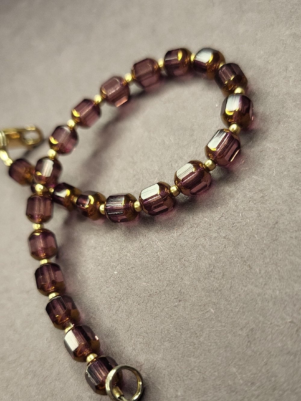 Elegant Purple and Gold Beaded Bracelet